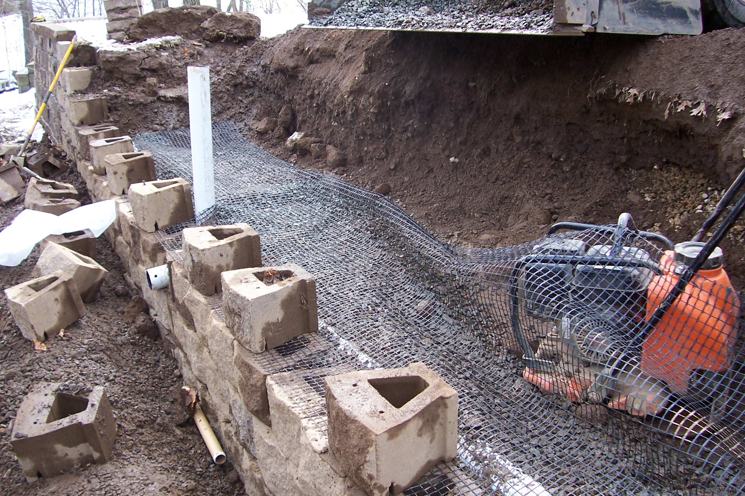 Rebuilding & Repairing a Retaining Wall Country Landscaping, LLC